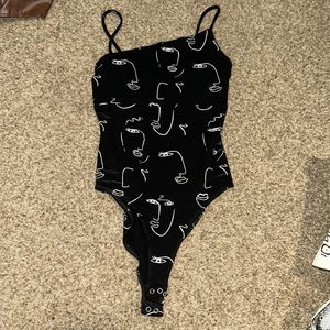 BRAND NEW black and white bodysuit